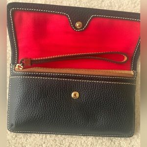 Dooney and Bourke Black pebbled Wristlet purse